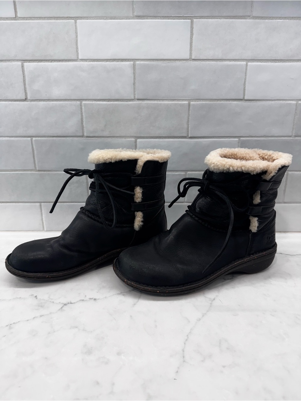 UGG Black Leather Caspia Lace-Up Ankle Boots with Cream Shearling Cuff
